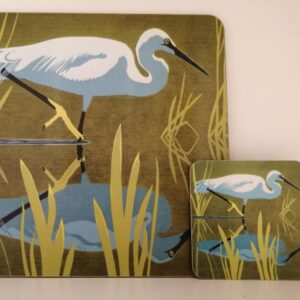 Matching placemat and coaster set featuring an illustrated white egret walking through reeds with a water reflection.