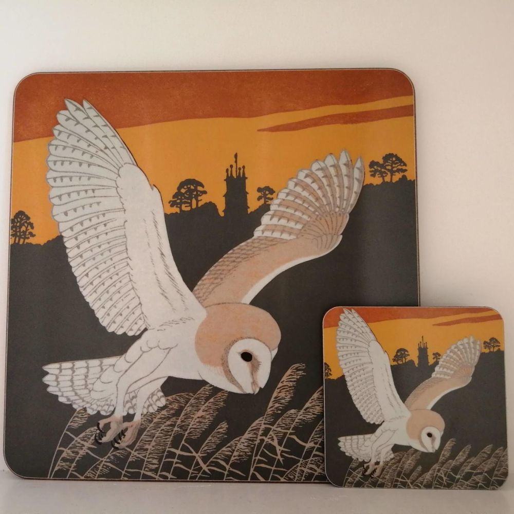 Matching placemat and coaster set featuring a barn owl flying over reeds against an orange sunset sky.